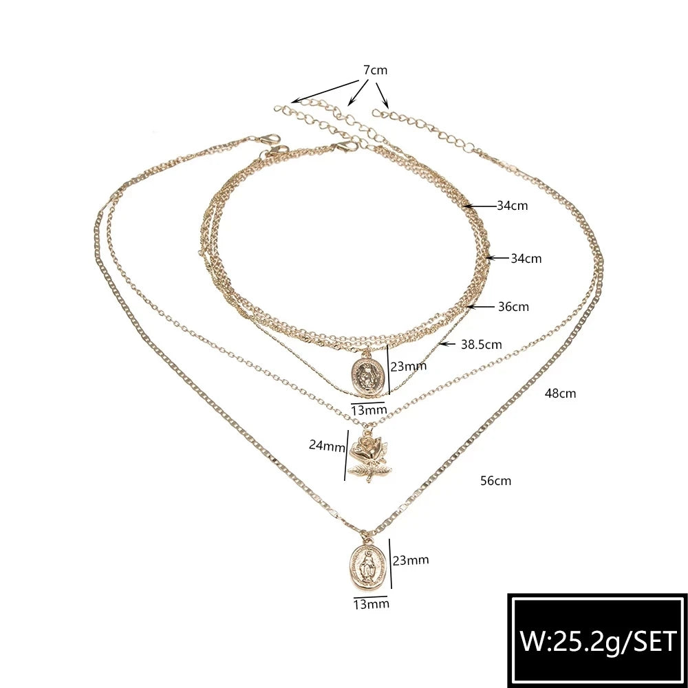 Multi-Length Gold Necklace with Three Charms