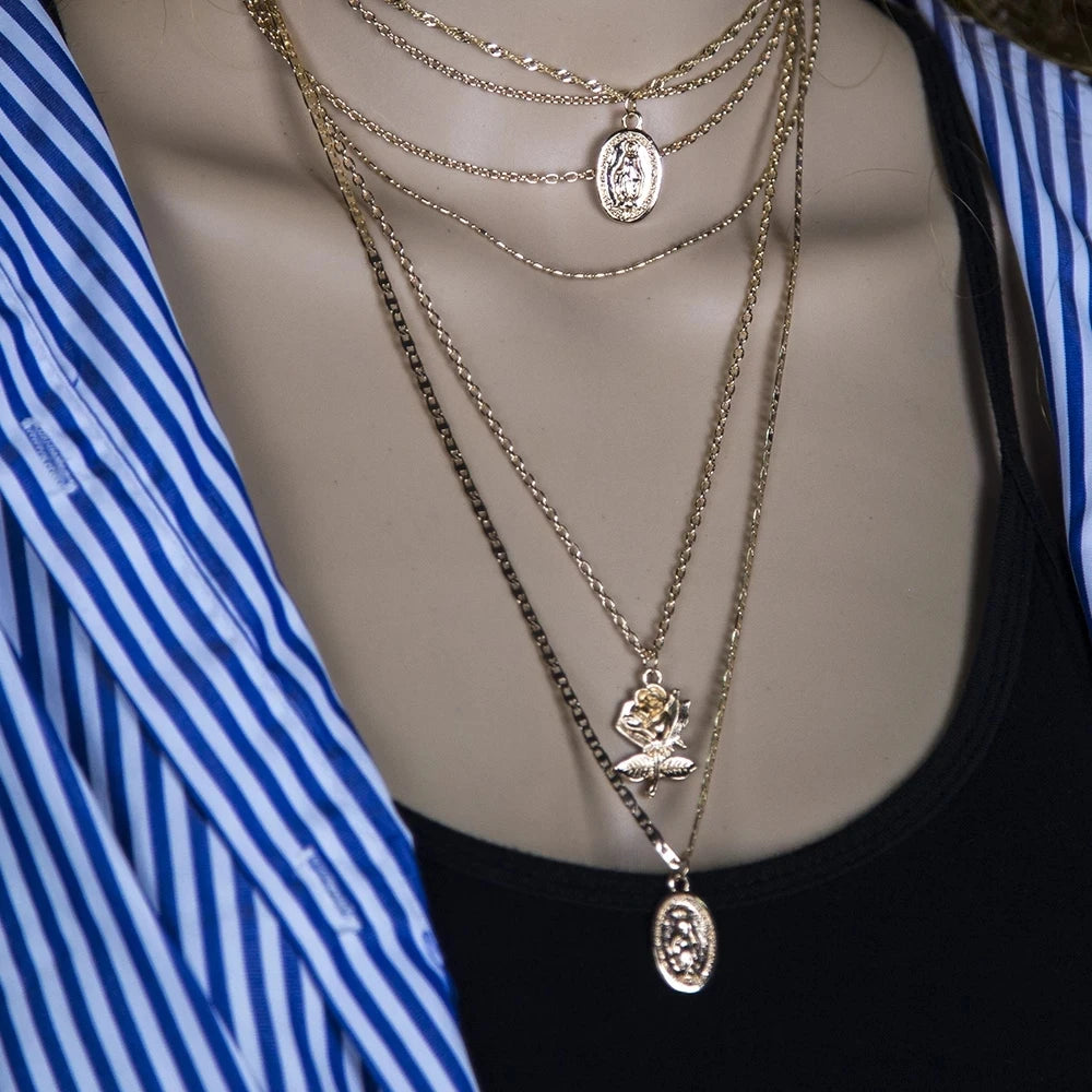 Multi-Length Gold Necklace with Three Charms