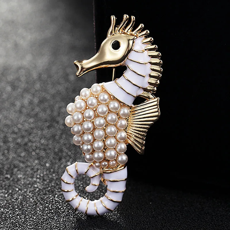 Gold, White Enamel and Pearl Beaded Sea Horse Brooch