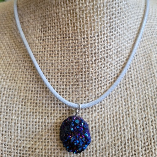 Reddish Blue Crystal Pendant On Baby Blue Rope