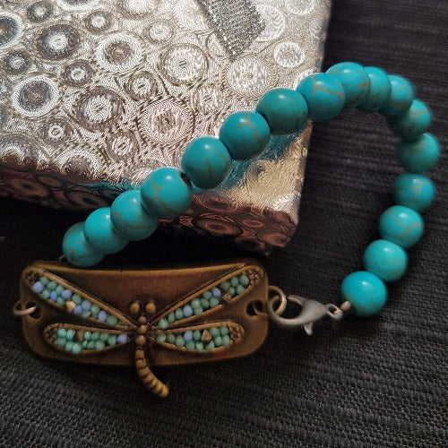 Turquoise Beads with Metal Butterfly Medallion